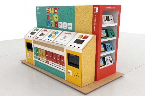 Interactive cardboard display with electronics and colorful product packaging.
